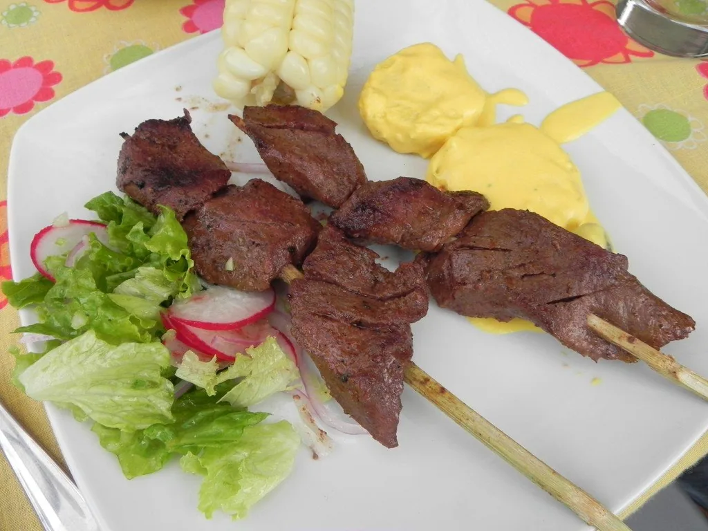 Grilled beef heart served on a stick