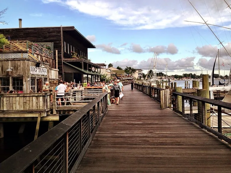 Long wooden pier on a sunny day in Georgetown SC.