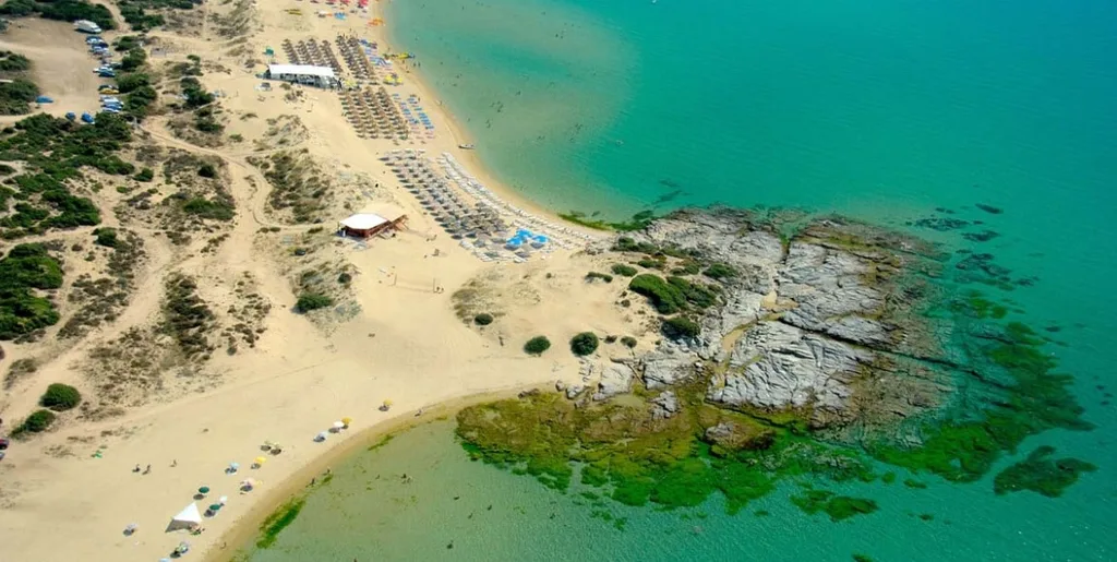Emerald sea at Ammolofoi beach in Kavala