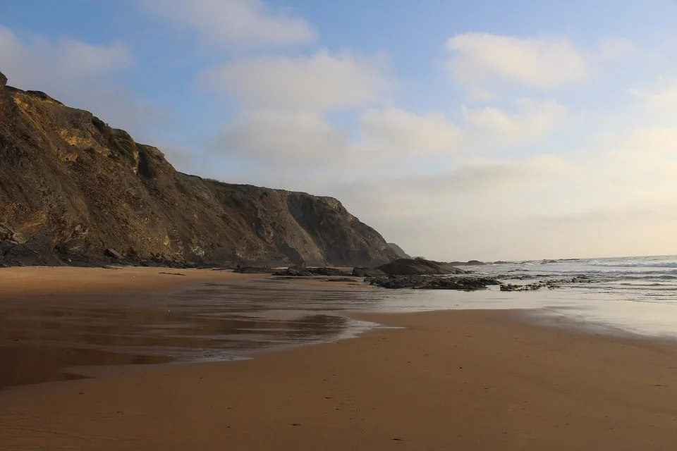 Sandy Beach and Cliffs near Aljezur, Portugal