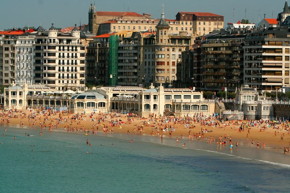 A curved shoreline along a vibrant bay in San Sebastián