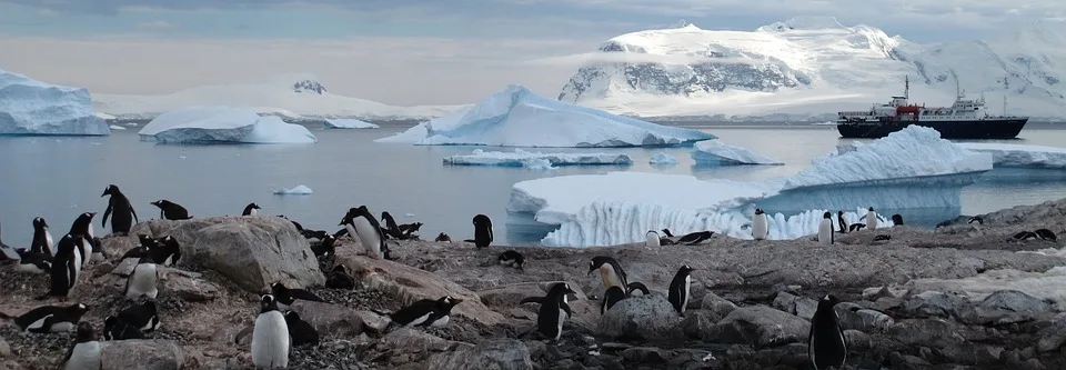 A ship arriving at the Antarctic coastline