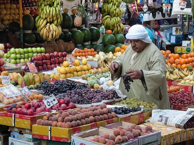 Man browsing fruit in an Egyptian market