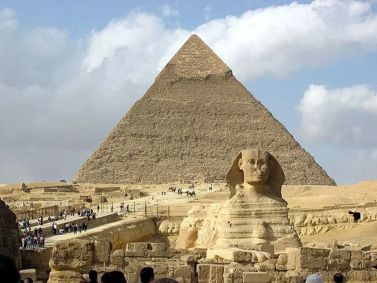 Sphinx in front of Pyramid in Giza