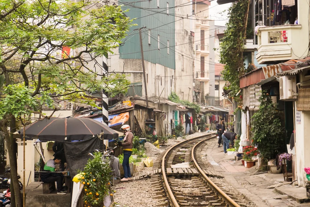 People sitting near Hanoi Railway