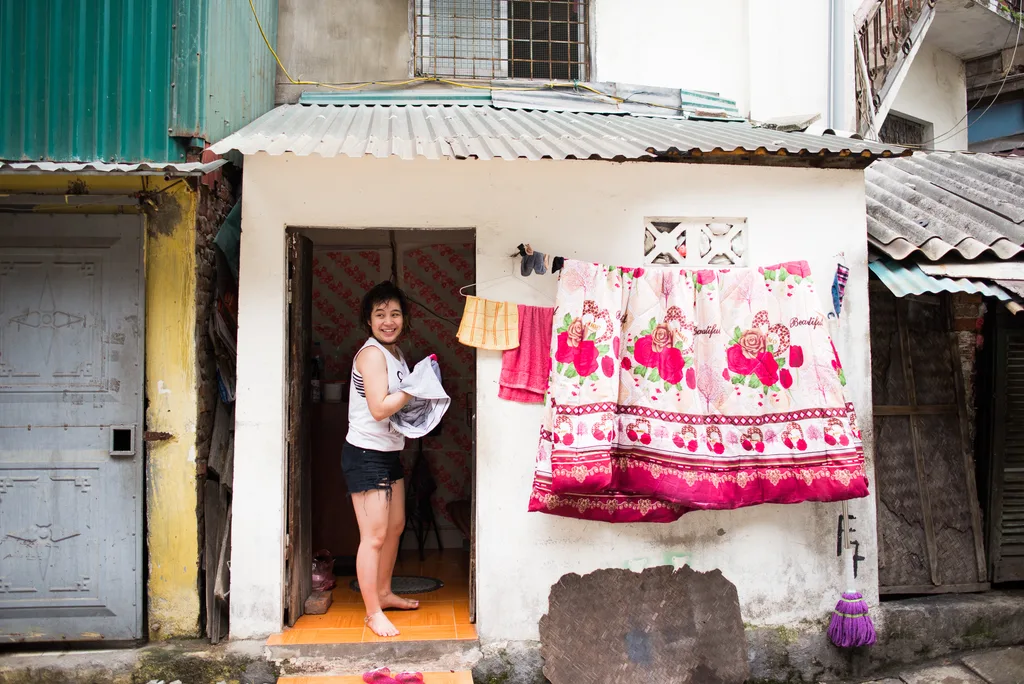 Smiling girl in Hanoi train street