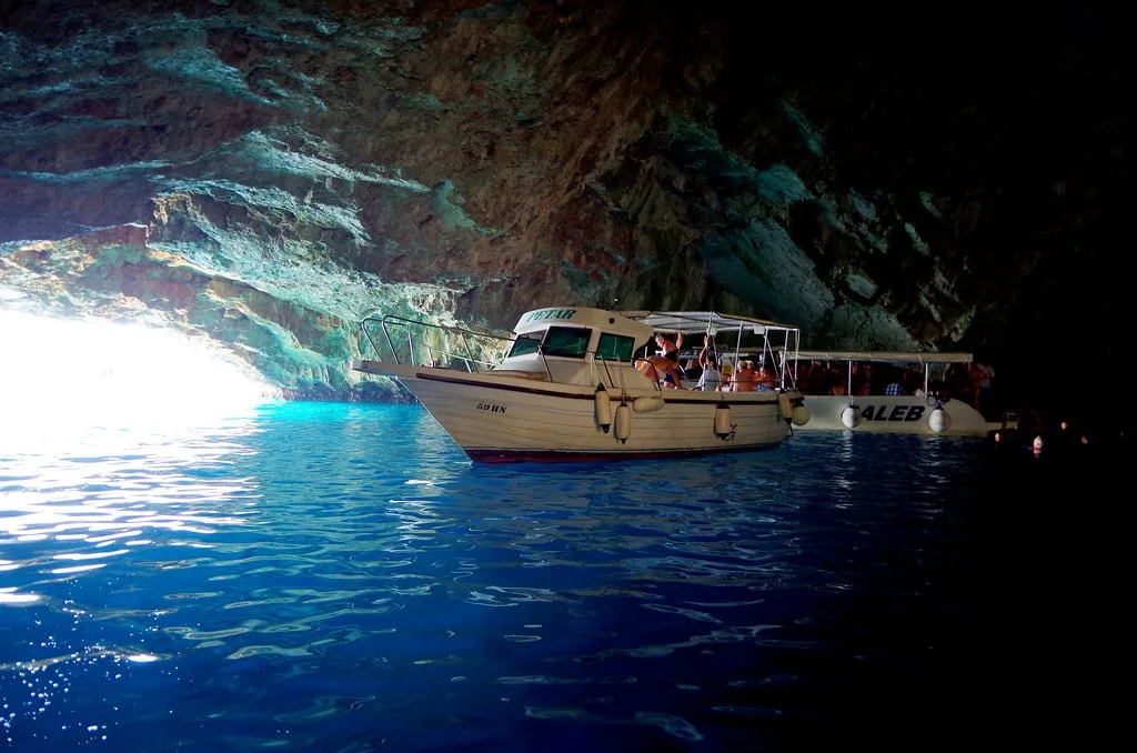 The surreal blue hues of the sea in the Blue Cave in Kotor